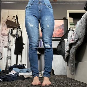 High waisted, body contouring jeans